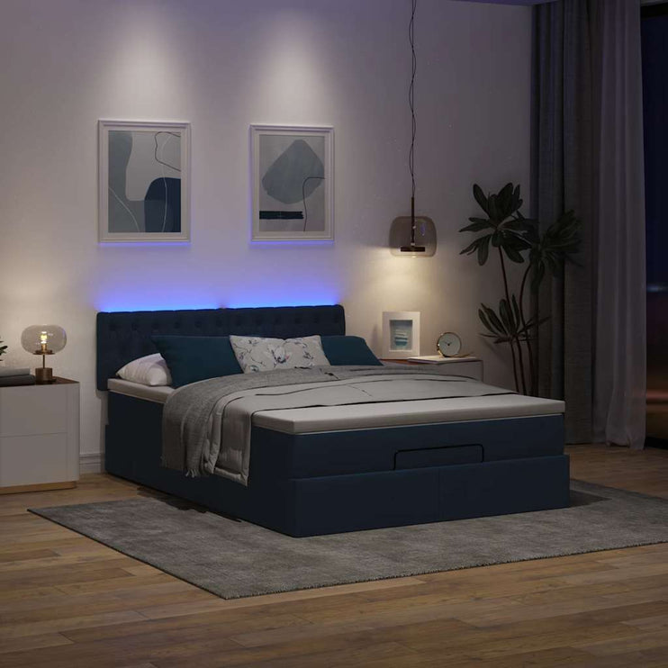 Ottoman säng med madrass och LED-lampor blå 140x190 cm tyg